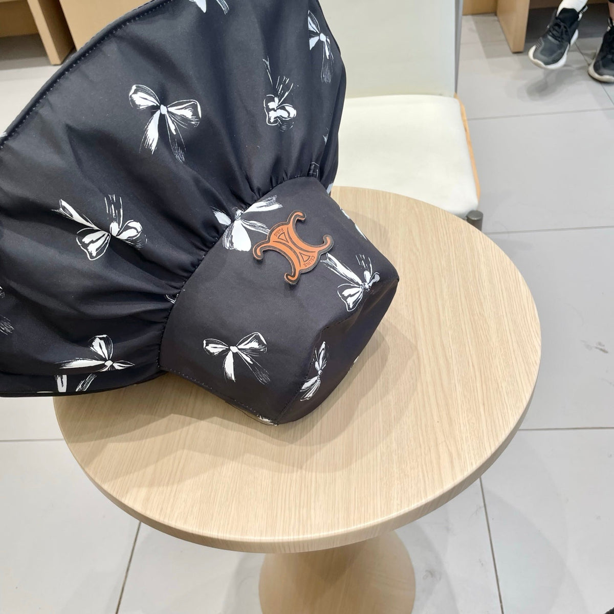 CELINE 25S BUCKET BOW HAT 733402 IN BLACK